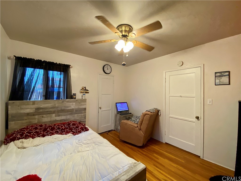 130 Pacific Street Bakersfield, CA 93305 - Photo 15 of 25 a living room with furniture and a chandelier