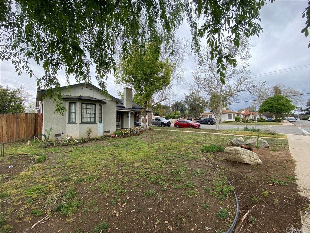 130 Pacific Street Bakersfield, CA 93305 - Photo 2 of 25 a view of a house with a yard