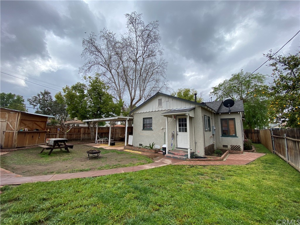 130 Pacific Street Bakersfield, CA 93305 - Photo 21 of 25 a view of a yard with chairs and a small yard