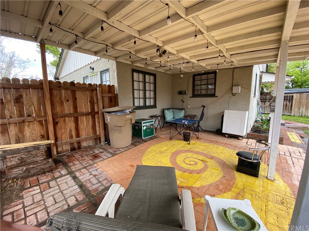 130 Pacific Street Bakersfield, CA 93305 - Photo 22 of 25 a view of a swimming pool with a patio