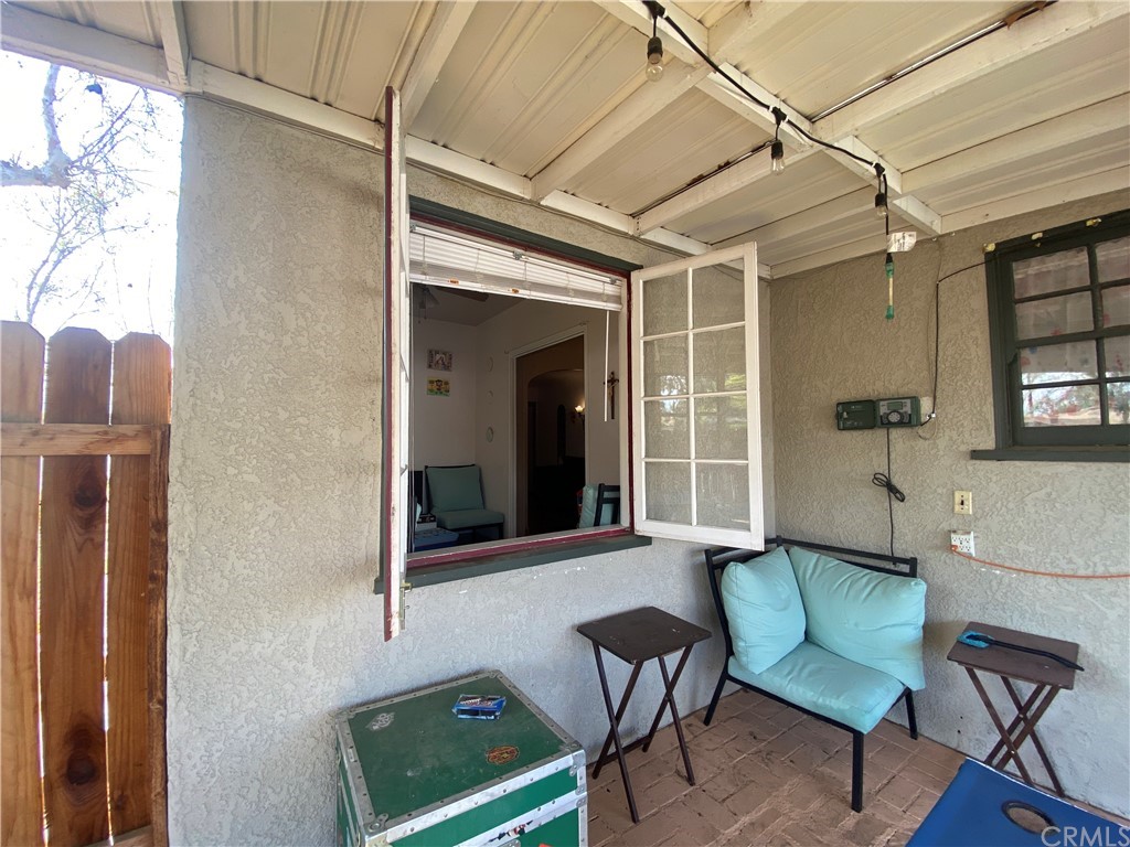 130 Pacific Street Bakersfield, CA 93305 - Photo 23 of 25 a living room with furniture and a window