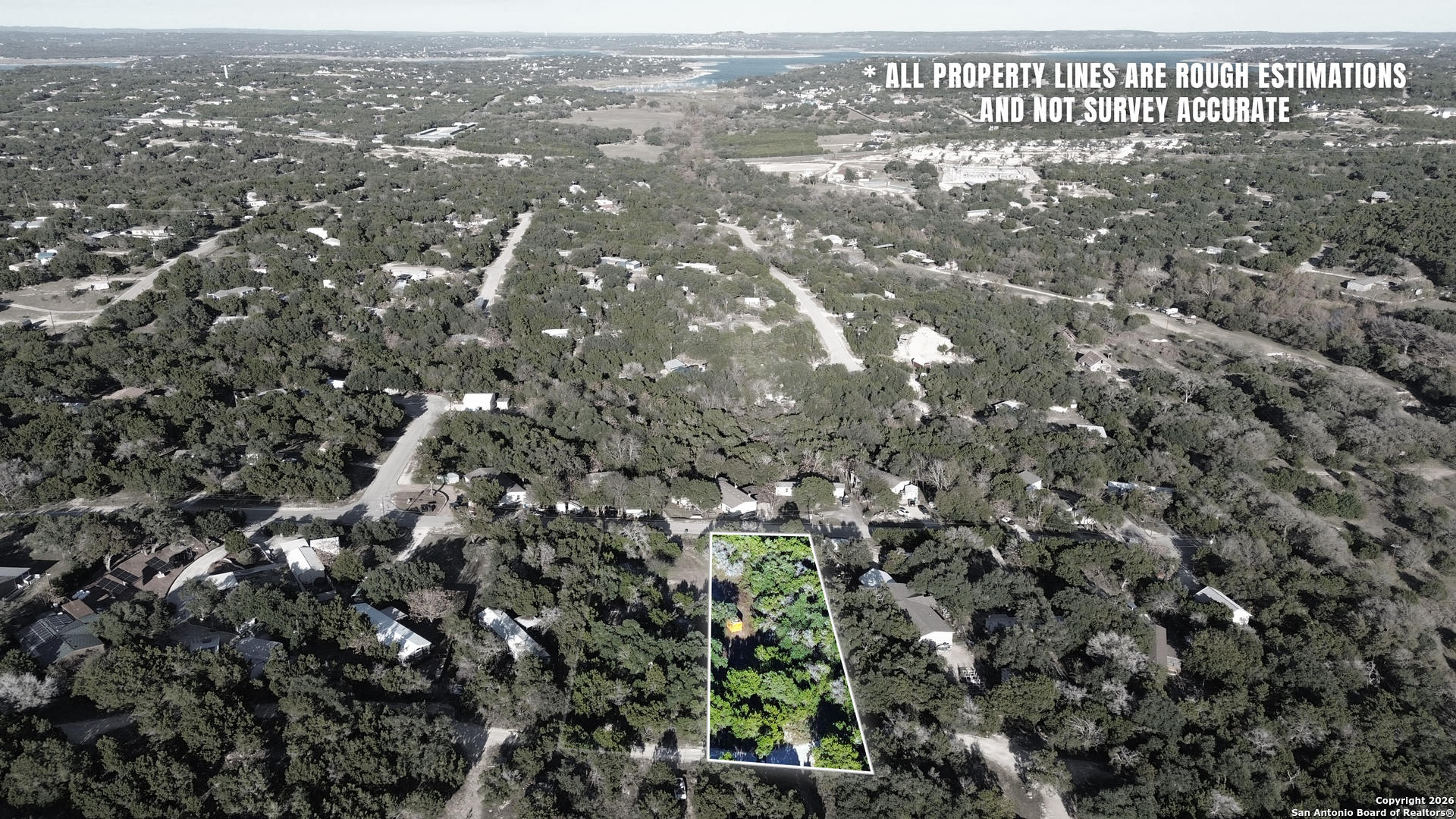 4527 Chamberlain Way Canyon Lake, TX 78133 - Photo 6 of 22 an aerial view of residential houses with city view