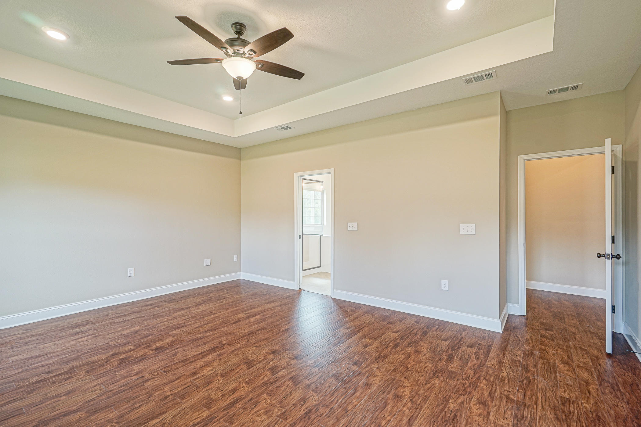 6193 Timberland Ridge Drive Crestview, FL 32539 - Photo 14 of 37 wooden floor in an empty room