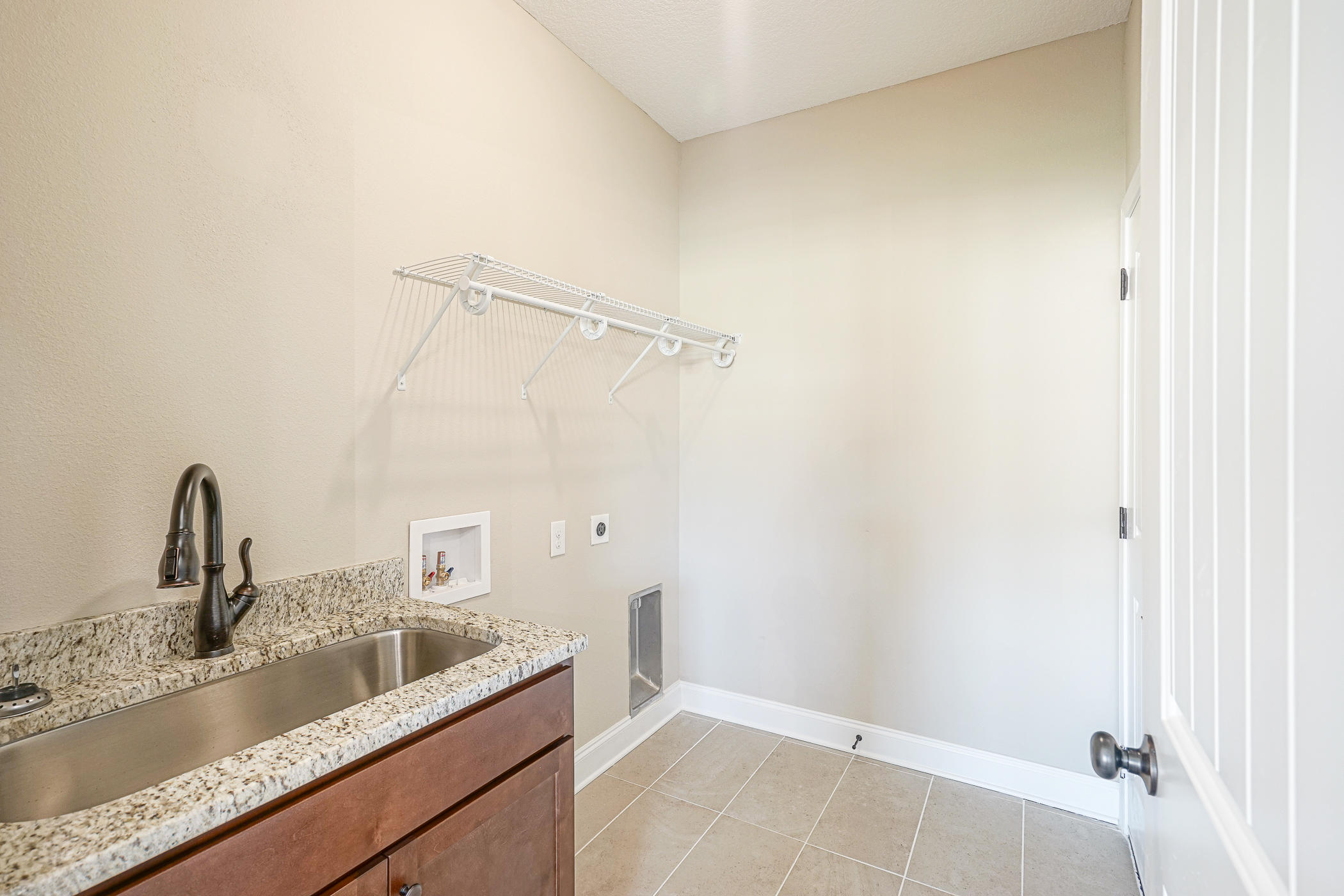 6193 Timberland Ridge Drive Crestview, FL 32539 - Photo 24 of 37 a bathroom with a granite countertop sink and vanity