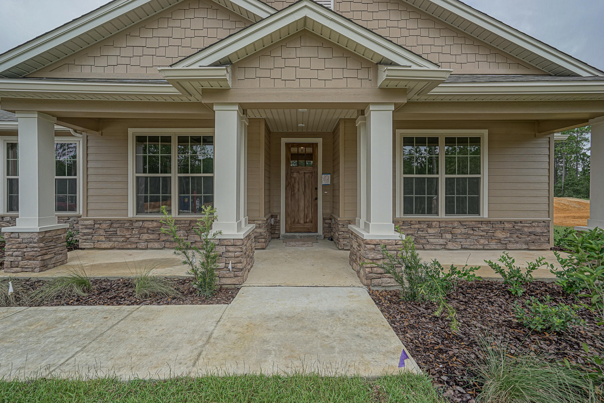 6193 Timberland Ridge Drive Crestview, FL 32539 - Photo 3 of 37 a front view of a house