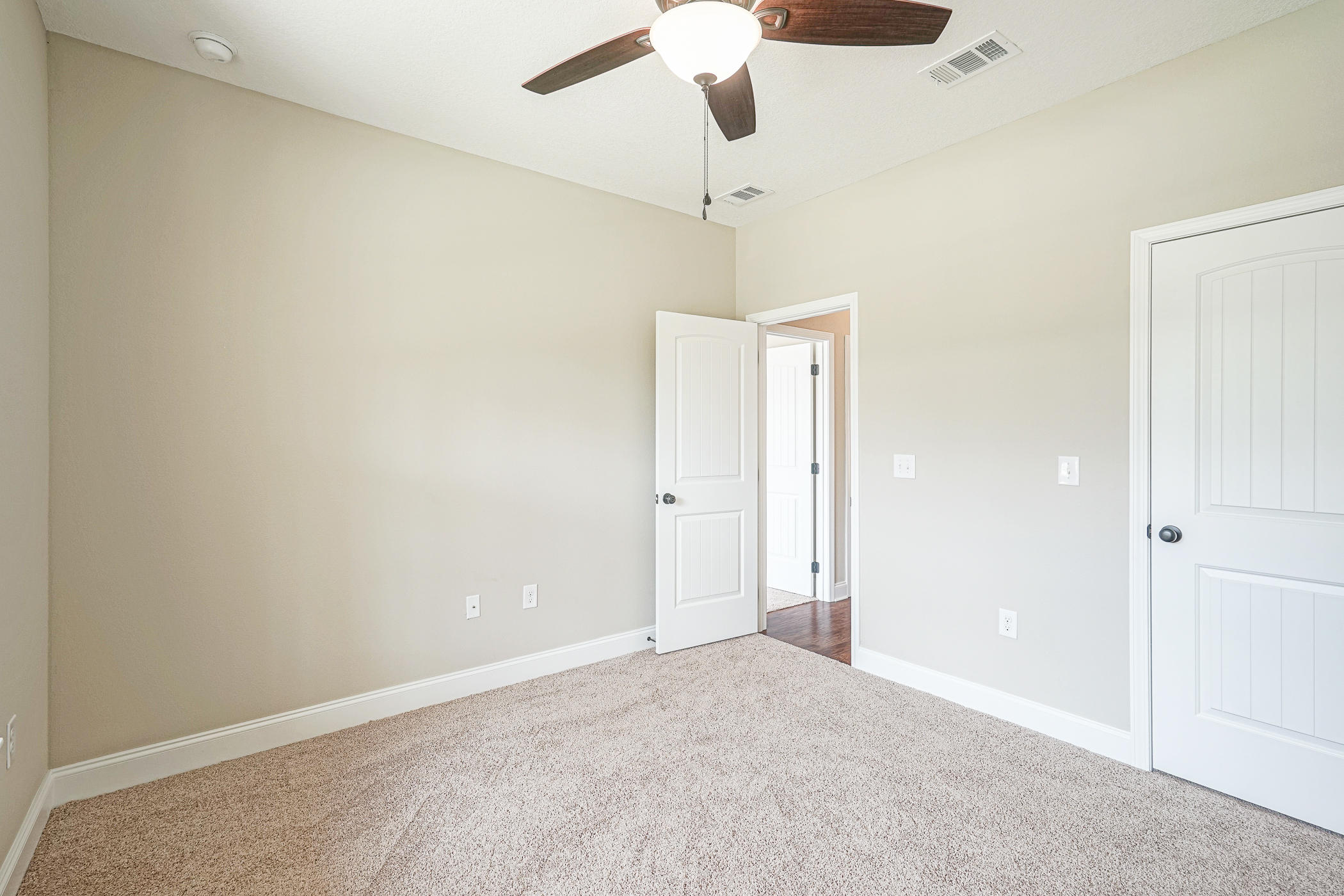 6193 Timberland Ridge Drive Crestview, FL 32539 - Photo 32 of 37 a view of an empty room and a ceiling fan