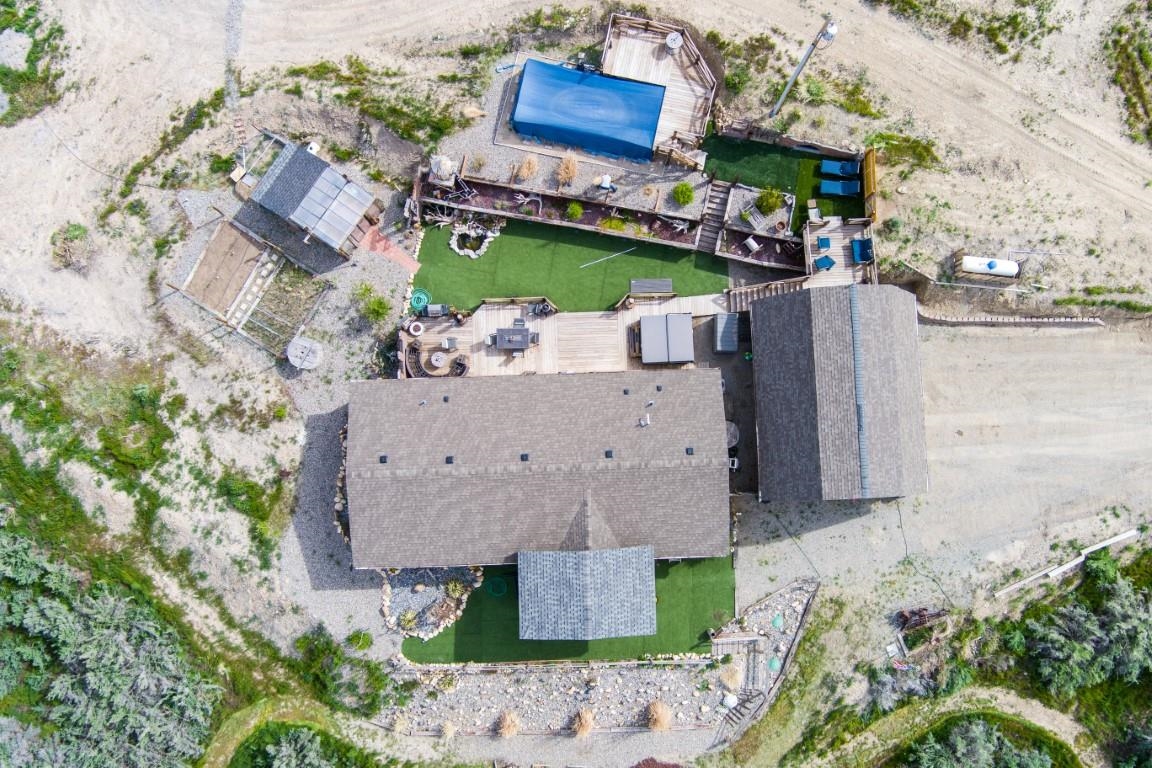 1792 10 Road Mack, CO 81525 - Photo 28 of 35 an aerial view of a house with a garden