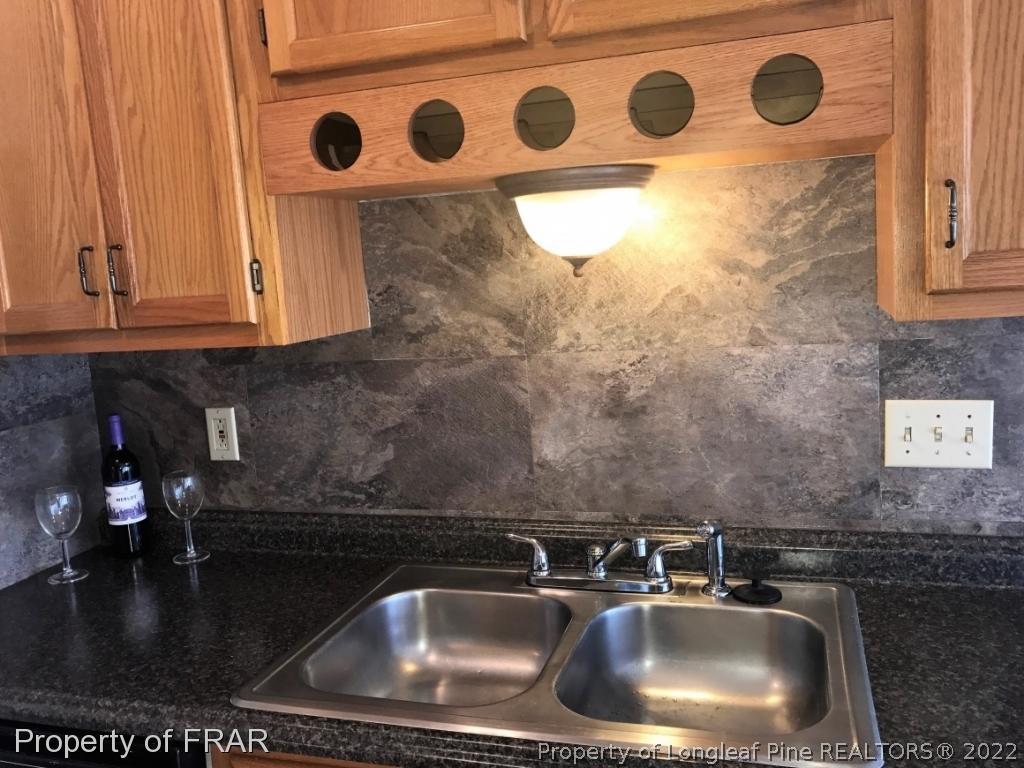 42 Woodwind Drive Spring Lake, NC 28390 - Photo 6 of 10 a close view of sink and tap