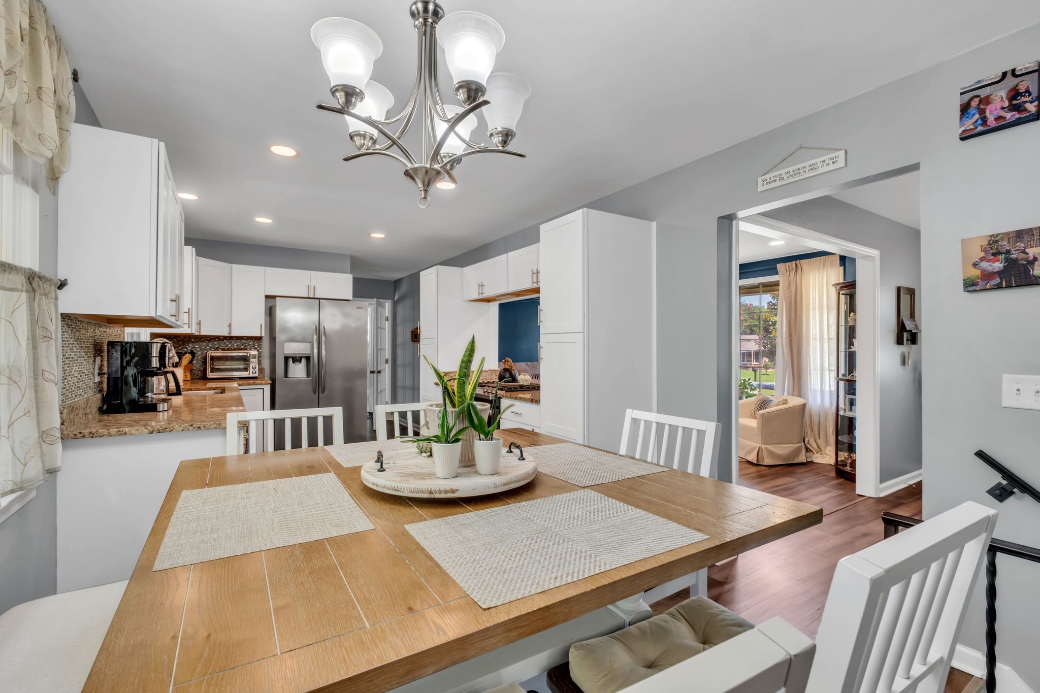 1708 Indian Hills Road Lebanon, TN 37087 - Photo 12 of 34 a view of a dining room with furniture and wooden floor