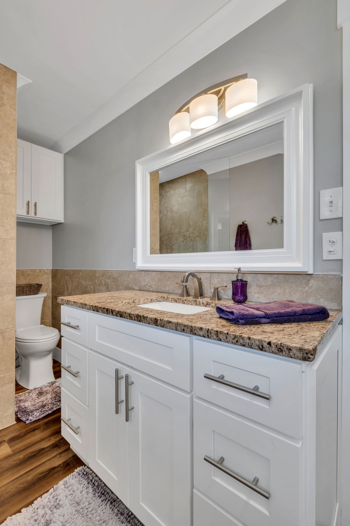 1708 Indian Hills Road Lebanon, TN 37087 - Photo 15 of 34 a bathroom with a granite countertop sink and a mirror