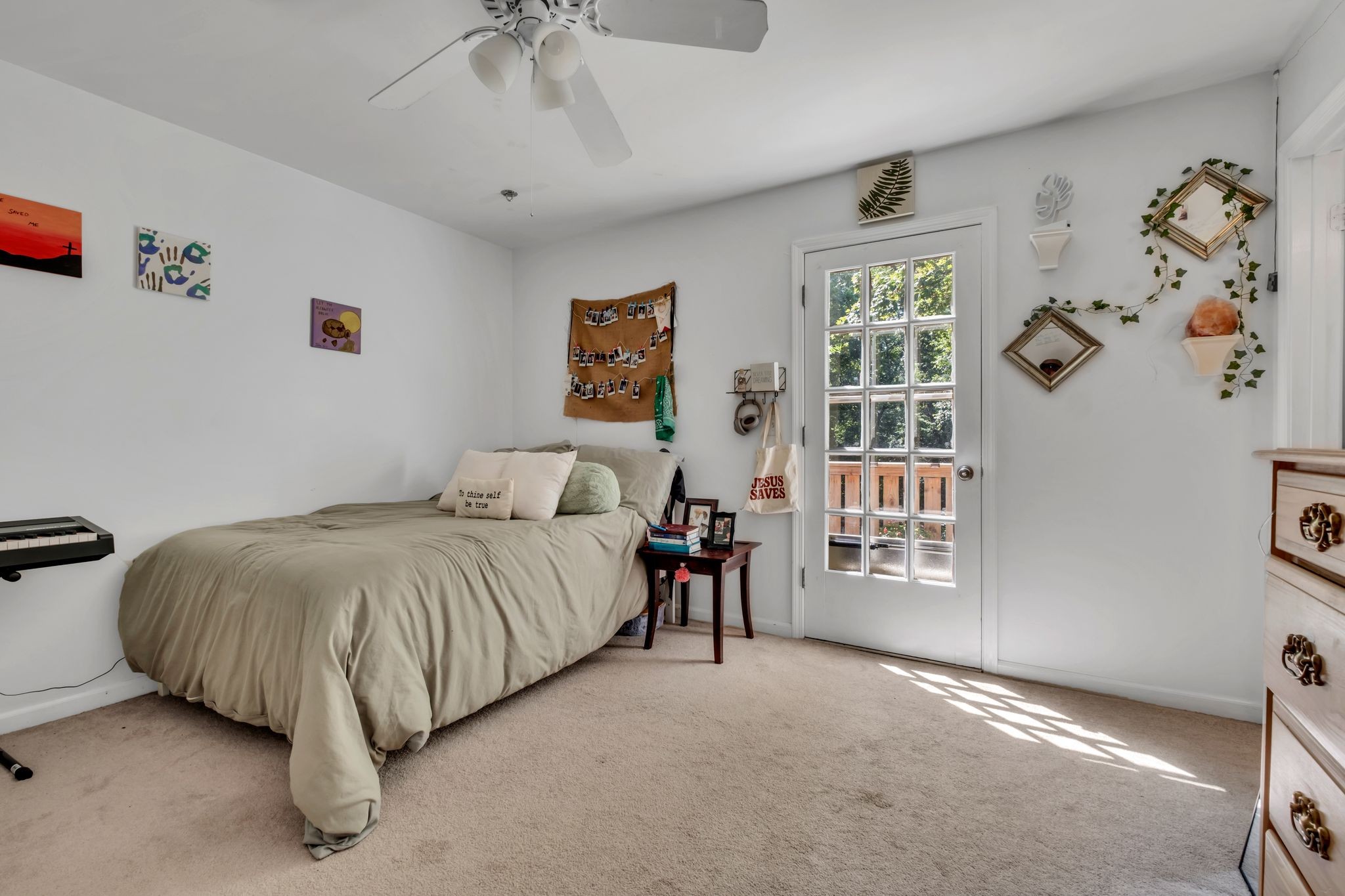 1708 Indian Hills Road Lebanon, TN 37087 - Photo 17 of 34 a spacious bedroom with a bed and a window