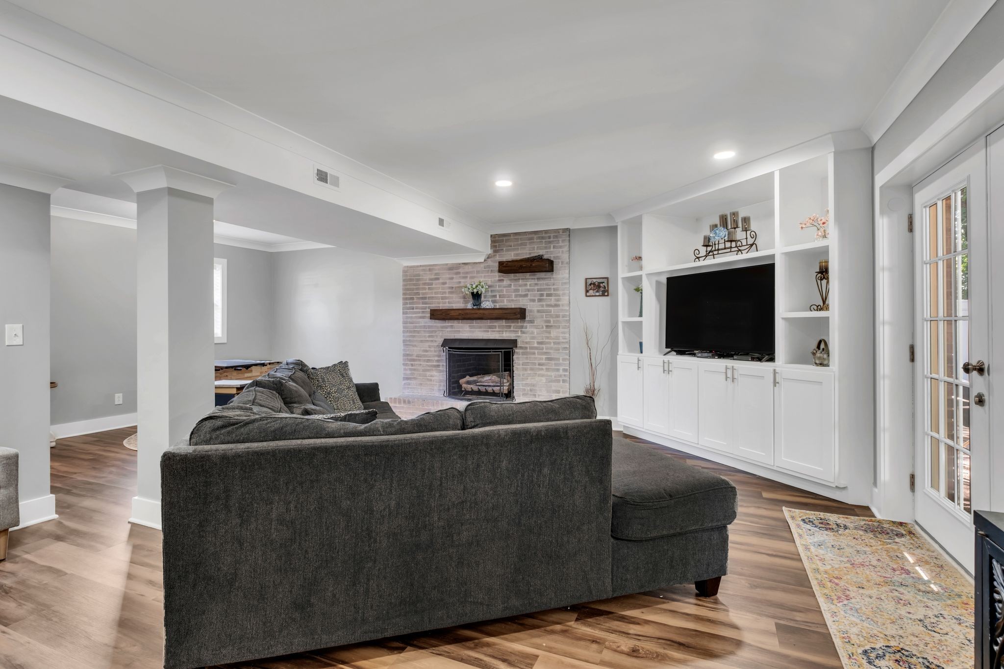 1708 Indian Hills Road Lebanon, TN 37087 - Photo 22 of 34 a living room with furniture and a flat screen tv