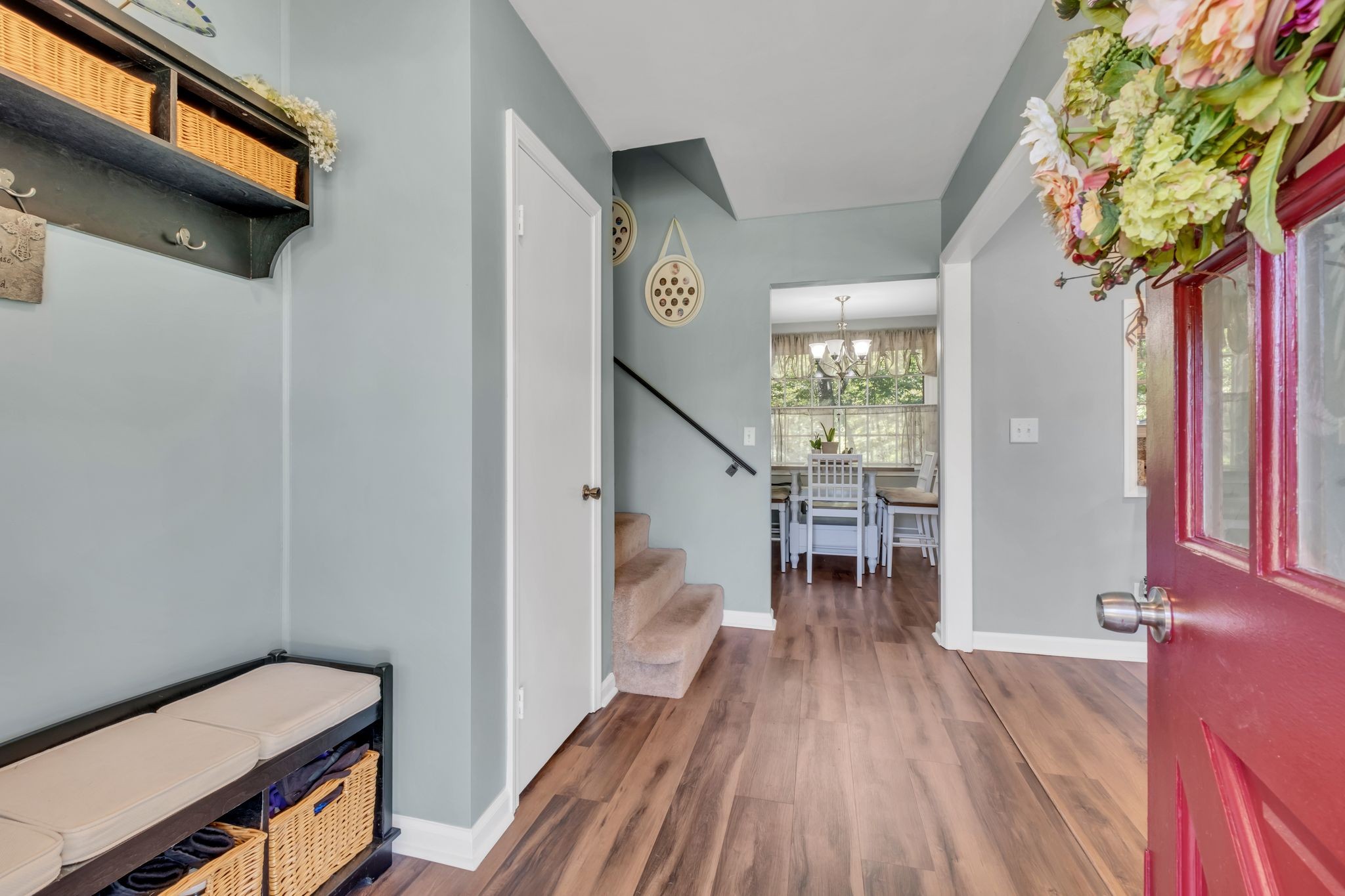 1708 Indian Hills Road Lebanon, TN 37087 - Photo 4 of 34 a view of a hallway with wooden floor and stairs