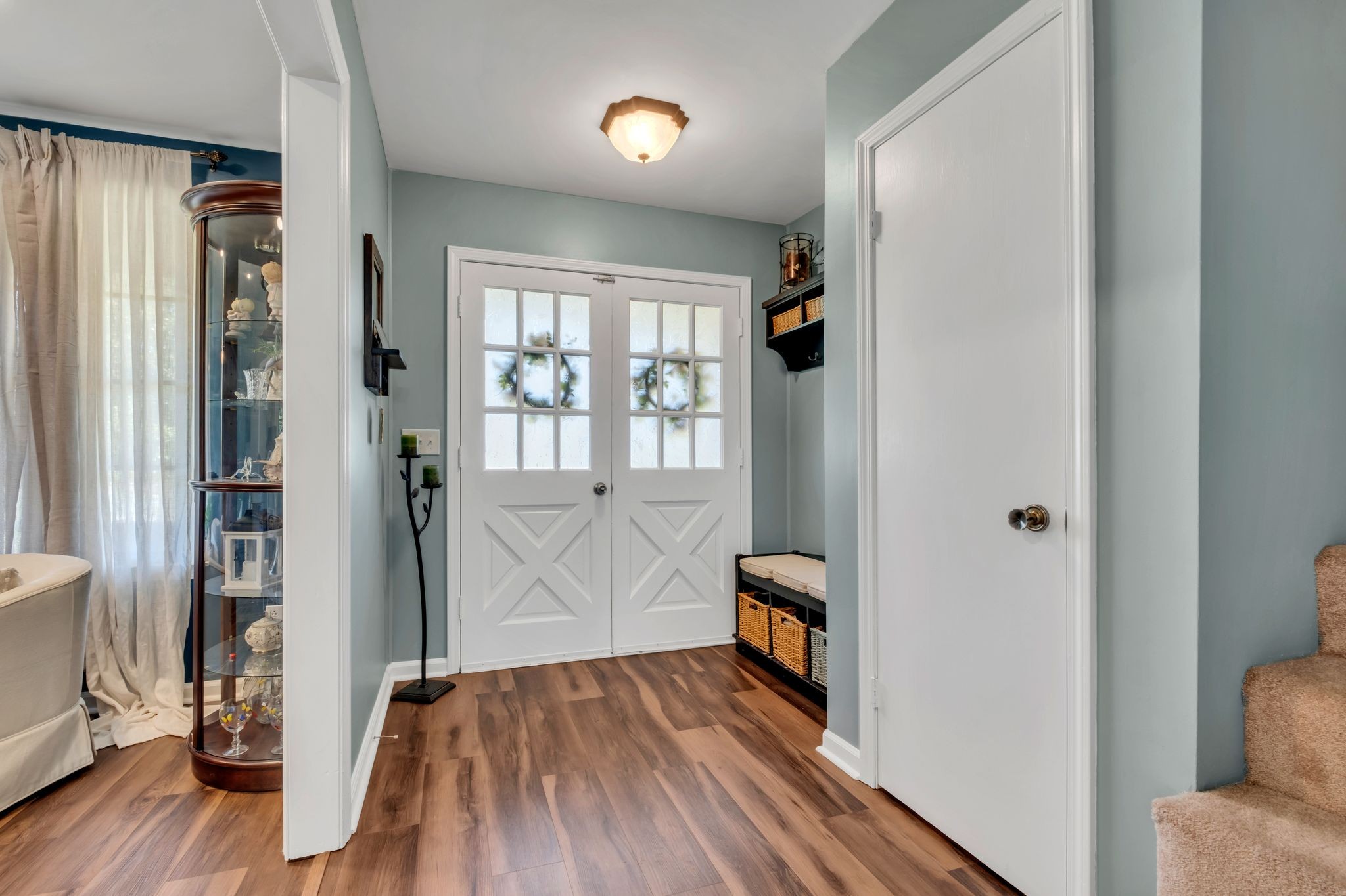 1708 Indian Hills Road Lebanon, TN 37087 - Photo 5 of 34 a view of hallway with wooden floor and stairs
