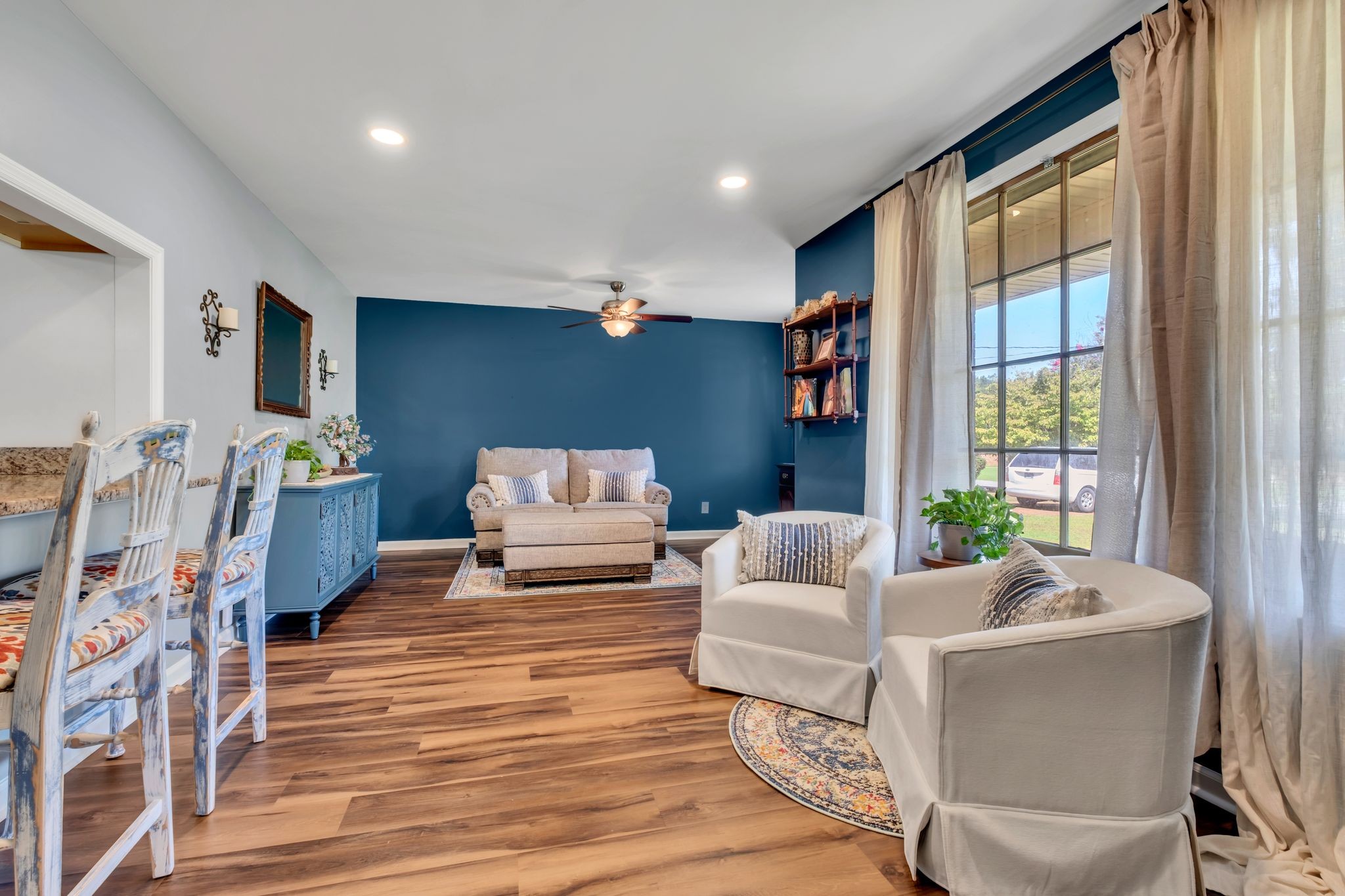1708 Indian Hills Road Lebanon, TN 37087 - Photo 6 of 34 a living room with furniture and large windows
