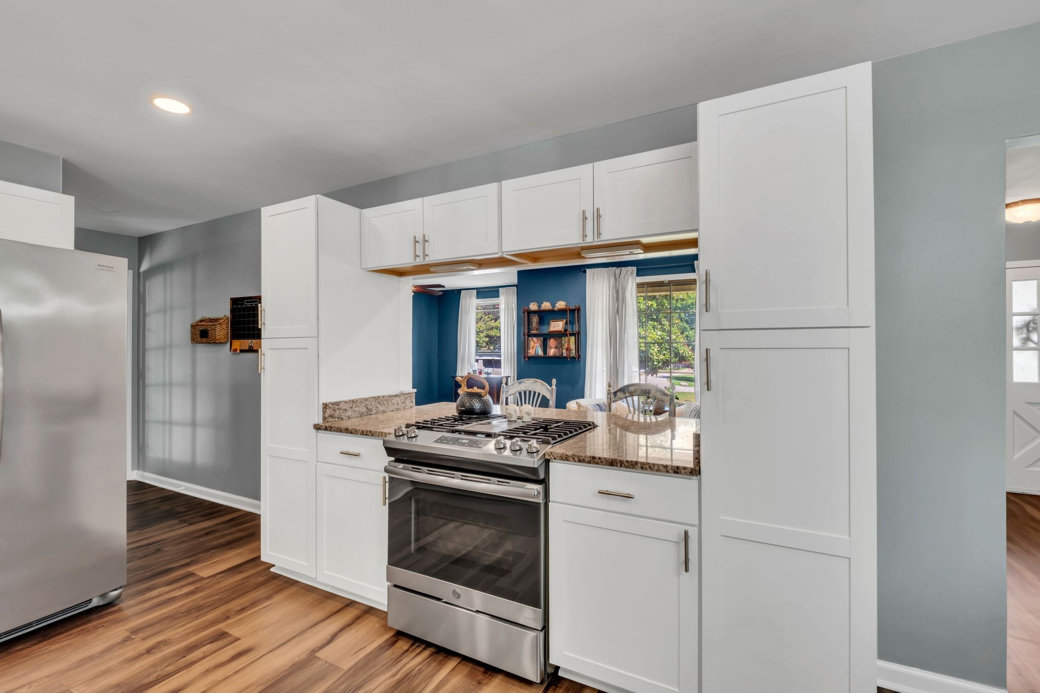 1708 Indian Hills Road Lebanon, TN 37087 - Photo 9 of 34 a kitchen with stainless steel appliances a refrigerator sink and stove