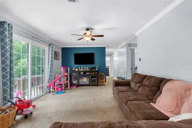 a bedroom with a bed and flat screen tv