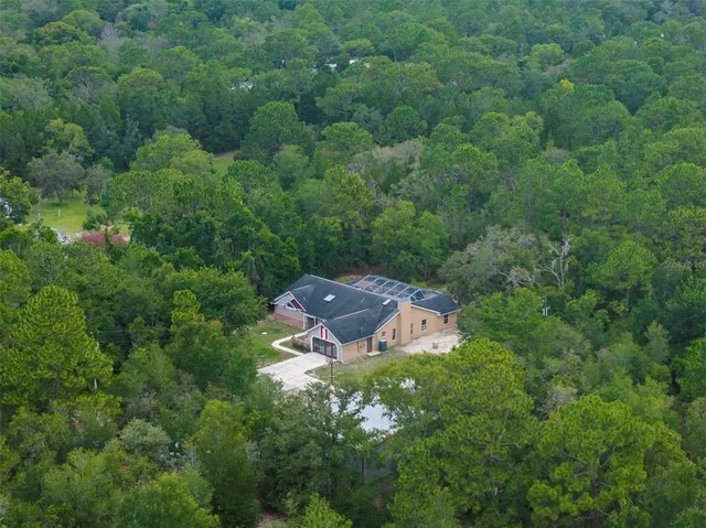 $995,000 | 17155 Dalberg Drive, Spring Hill, FL 34610