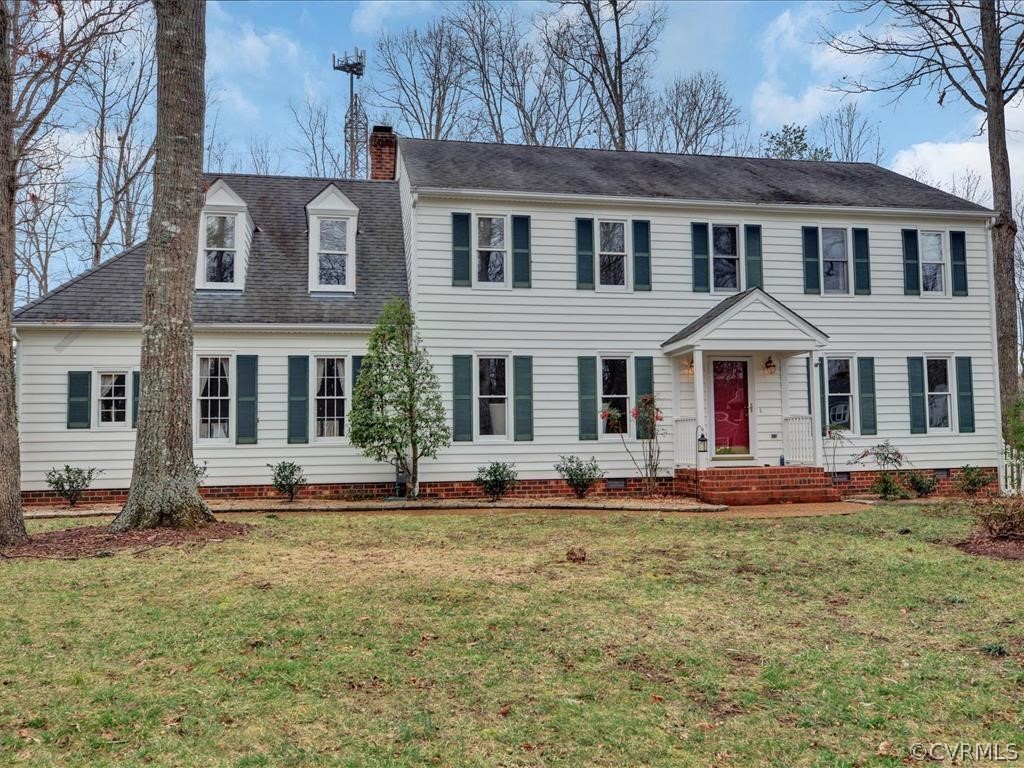 13313 Lady Ashley Road Midlothian, VA 23114 - Photo 2 of 33 front view of a brick house with a yard