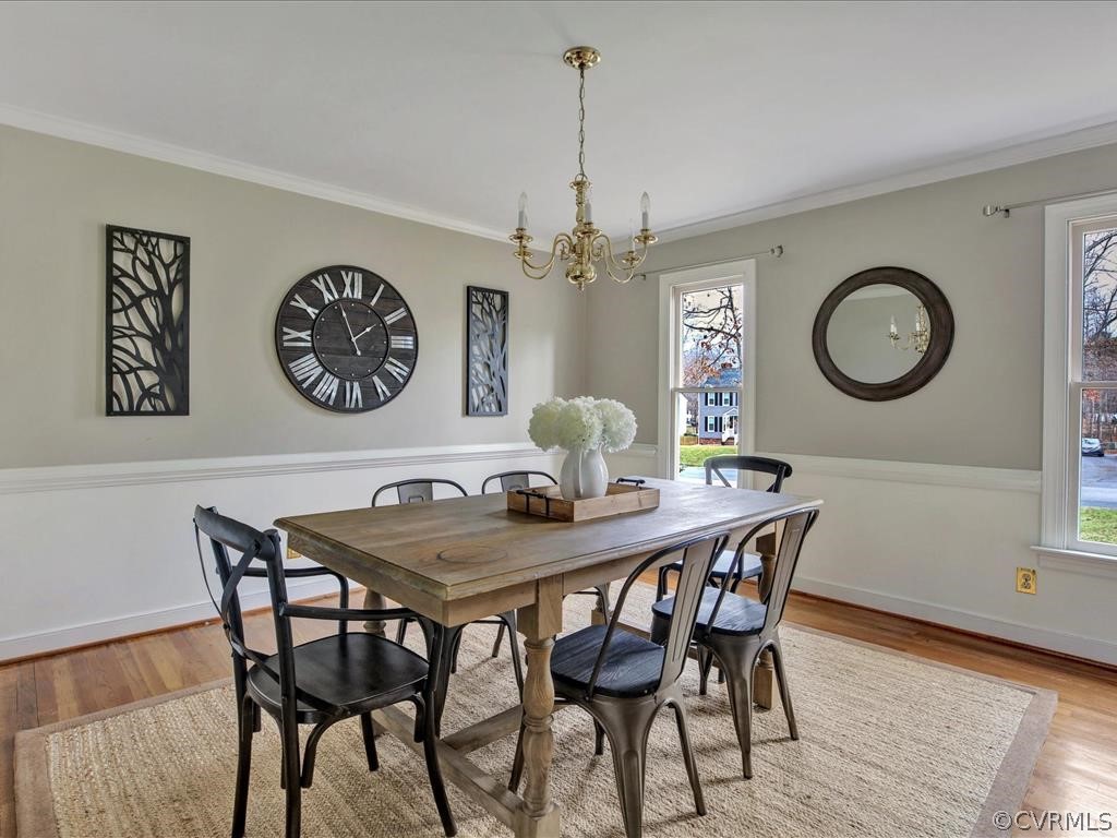 13313 Lady Ashley Road Midlothian, VA 23114 - Photo 7 of 33 a view of a dining room with furniture and a chandelier