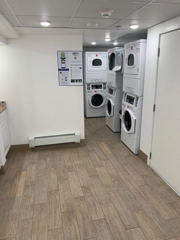 21 5th Street, Unit 26 Chelsea, MA 02150 - Photo 6 of 11 a view of a storage & utility room with washer and dryer