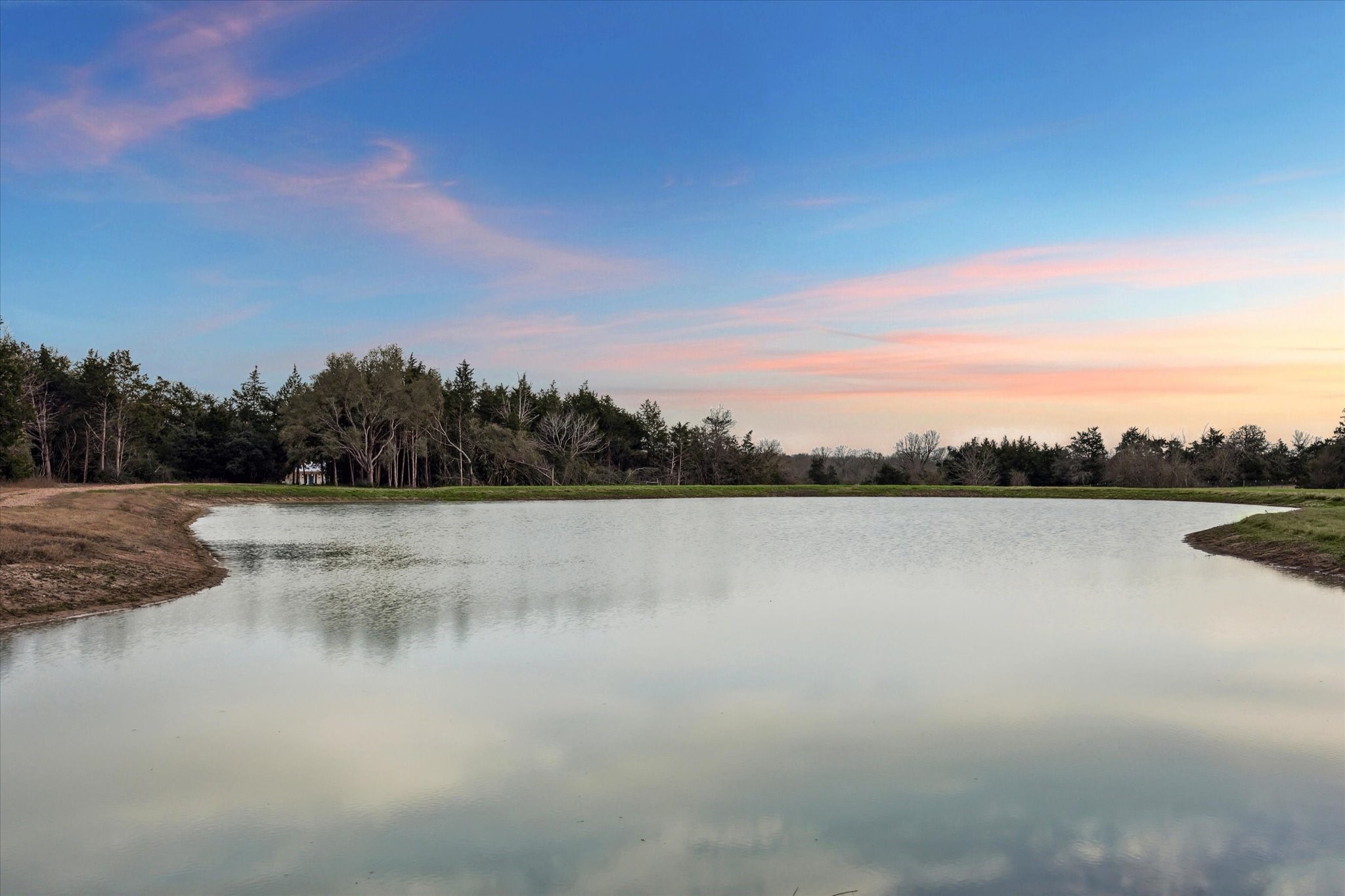 13167 Fm 389 Road Burton, TX 77835 - Photo 2 of 49 a view of lake with green space