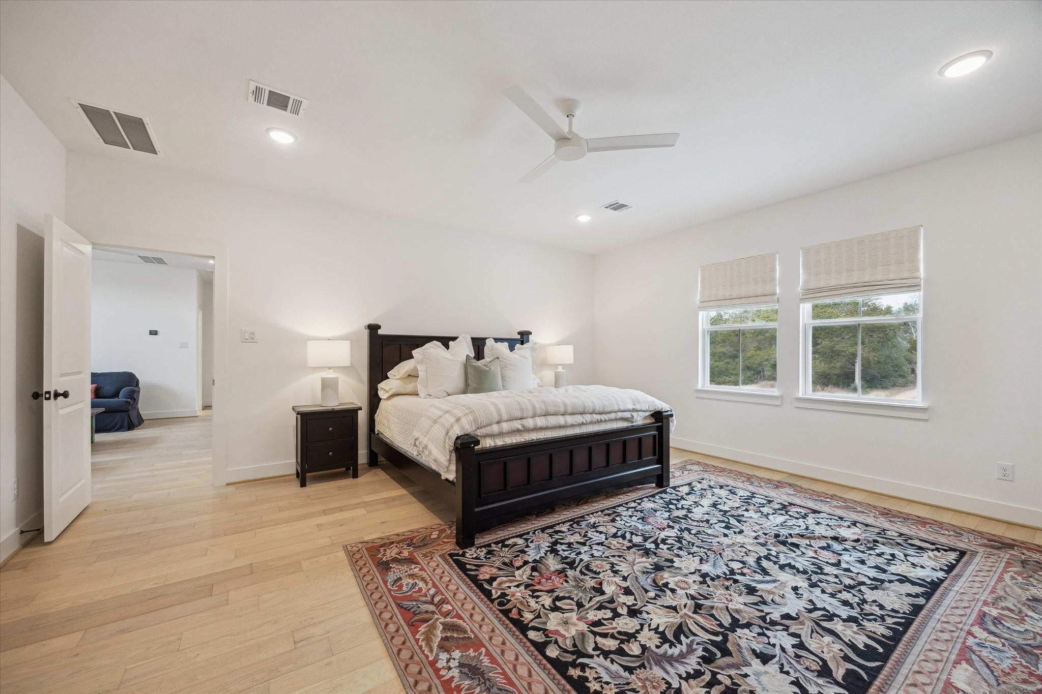 13167 Fm 389 Road Burton, TX 77835 - Photo 35 of 49 a bedroom with a bed and wooden floor
