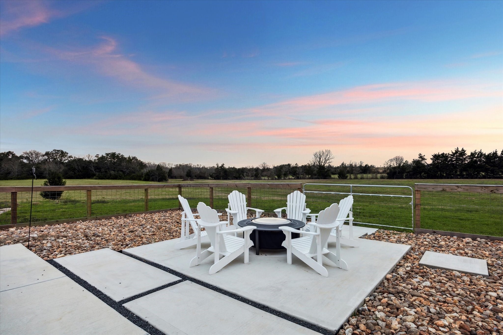 13167 Fm 389 Road Burton, TX 77835 - Photo 44 of 49 a view of a lake with table and chairs