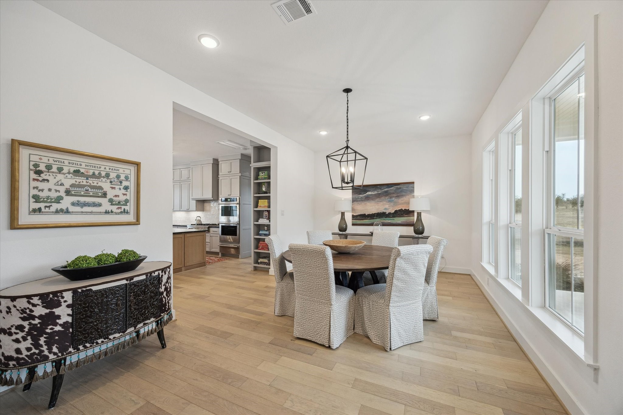 13167 Fm 389 Road Burton, TX 77835 - Photo 8 of 49 a view of a dining room with furniture window and wooden floor