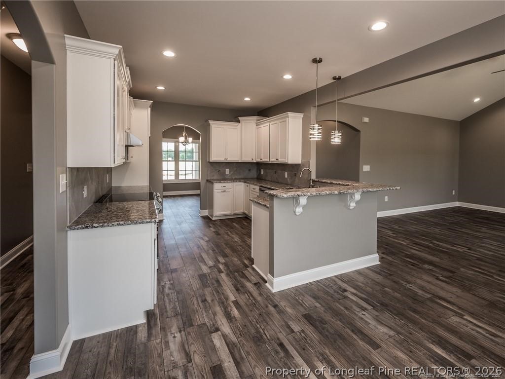 1102 West Carthage Road Lumberton, NC 28360 - Photo 14 of 41 a kitchen with a sink appliances and cabinets