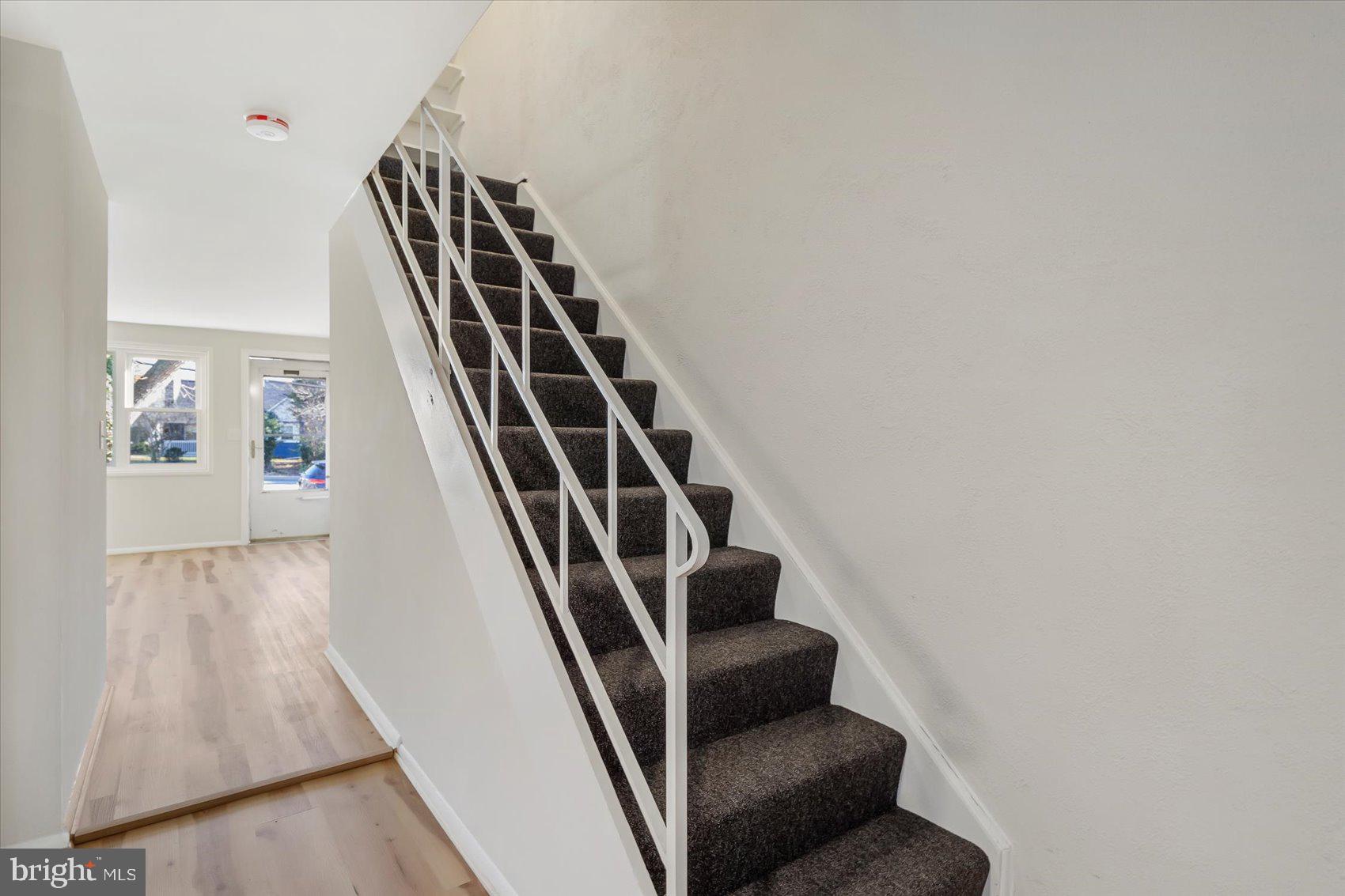 4322 Annapolis Road Baltimore, MD 21227 - Photo 14 of 28 a view of staircase with wooden floor
