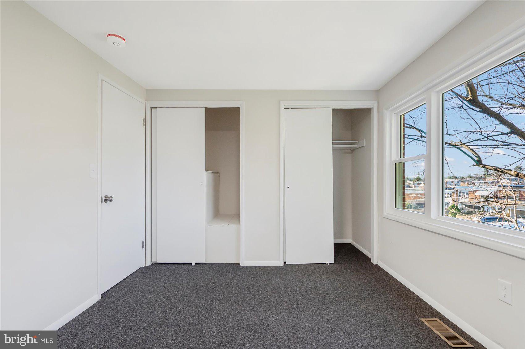 4322 Annapolis Road Baltimore, MD 21227 - Photo 19 of 28 a view of an empty room with a window