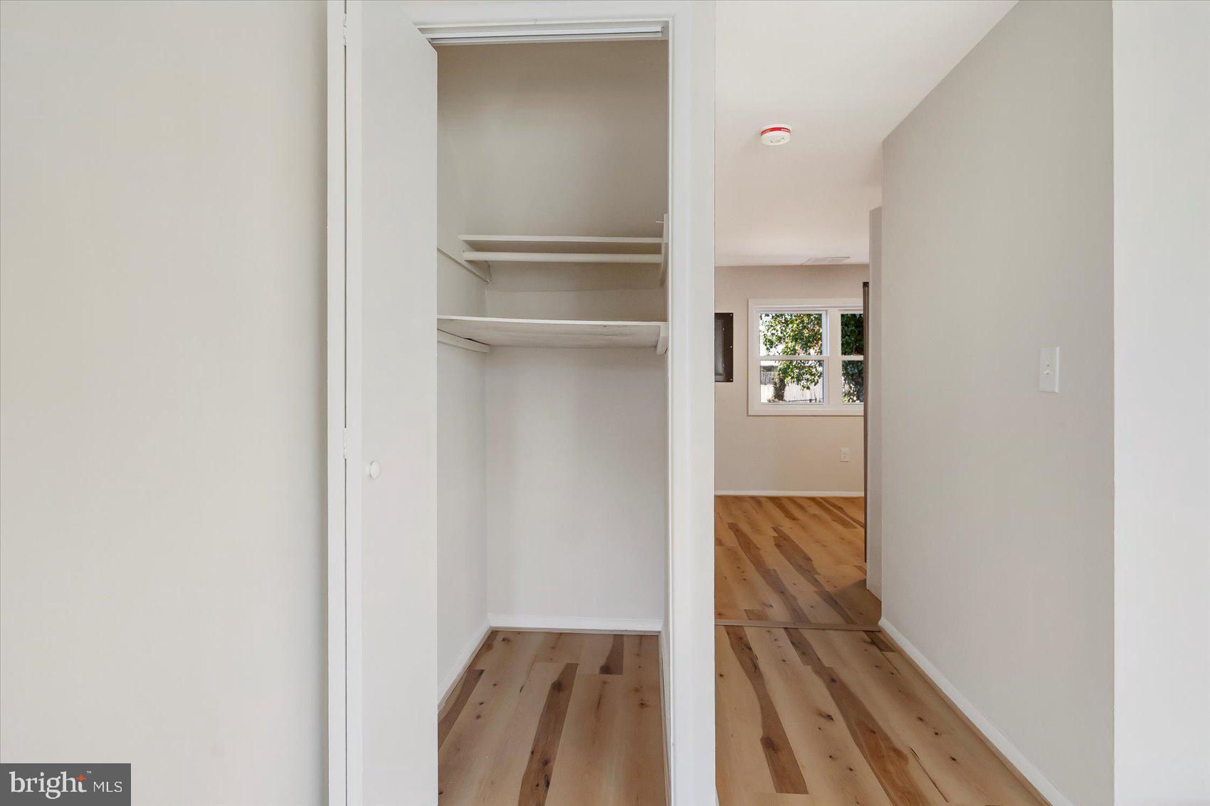 4322 Annapolis Road Baltimore, MD 21227 - Photo 7 of 28 a view of hallway with wooden floor