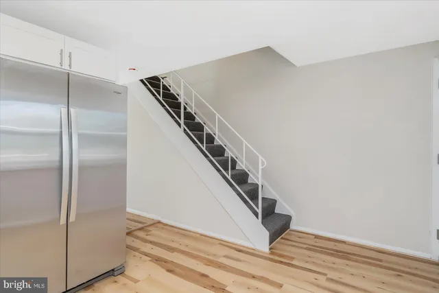 a view of a hallway with staircase