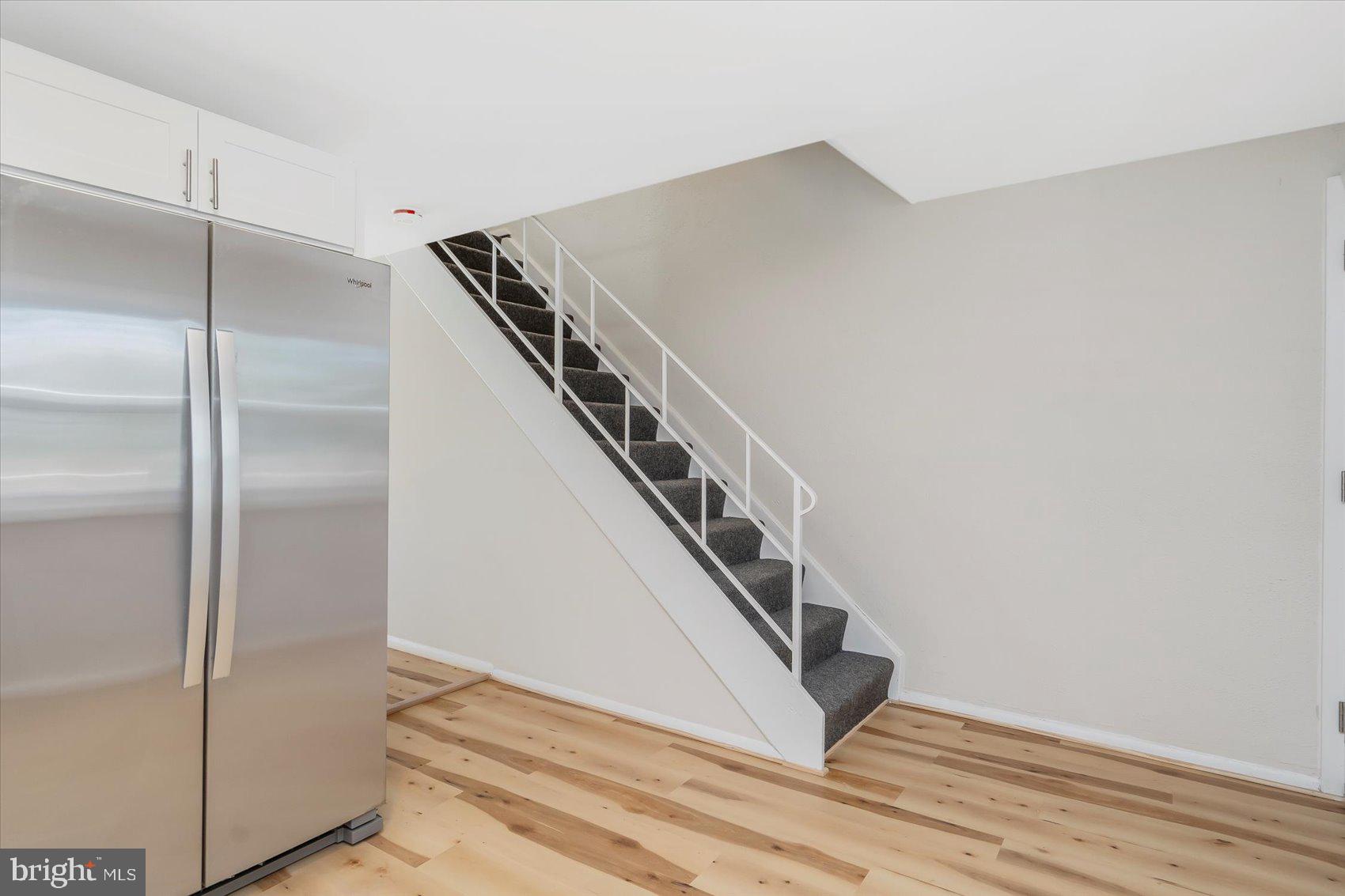 4322 Annapolis Road Baltimore, MD 21227 - Photo 10 of 28 a view of a hallway with staircase