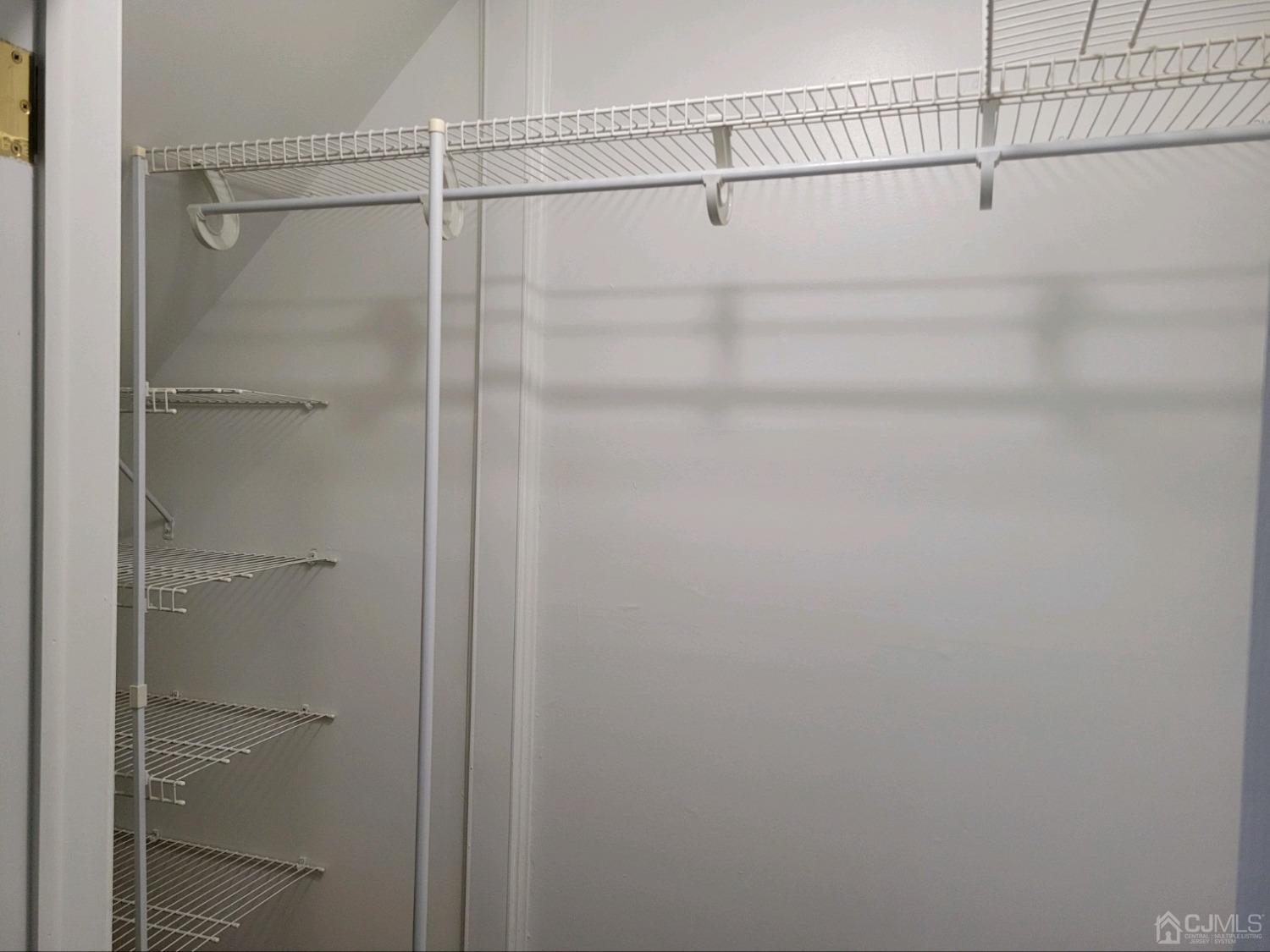 420 Cross Road, Unit 11 Matawan, NJ 07747 - Photo 11 of 15 a bathroom with a glass shower door