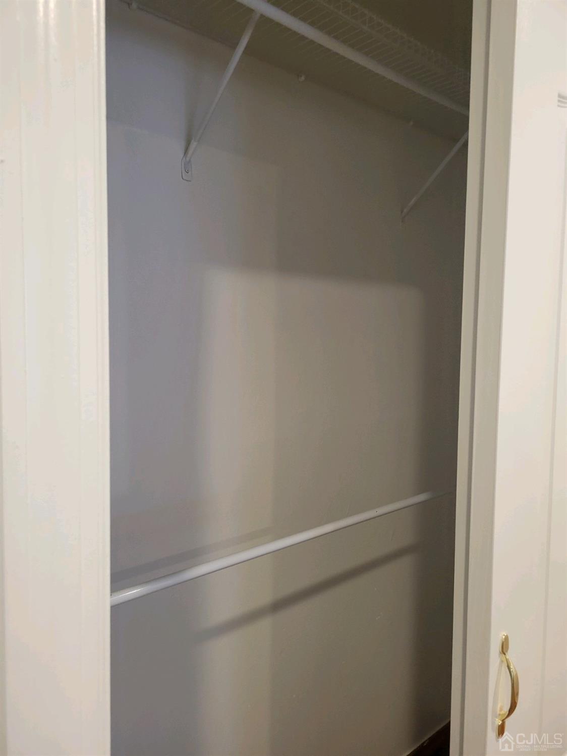 420 Cross Road, Unit 11 Matawan, NJ 07747 - Photo 12 of 15 a close up view of racks on the wall