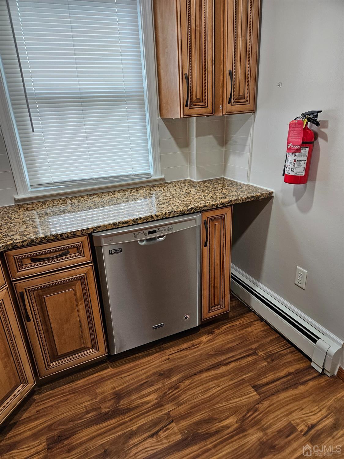 420 Cross Road, Unit 11 Matawan, NJ 07747 - Photo 4 of 15 a stove top oven sitting inside of a kitchen