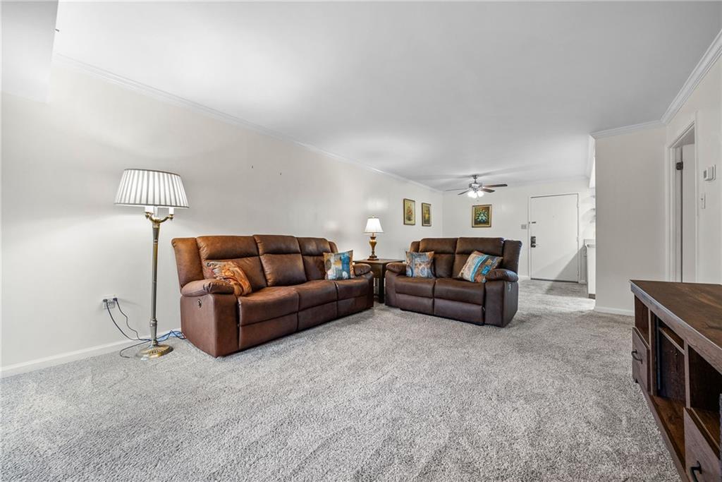 1500 Cochran Road, Unit 412 Pittsburgh, PA 15243 - Photo 16 of 45 a living room with furniture and a couch