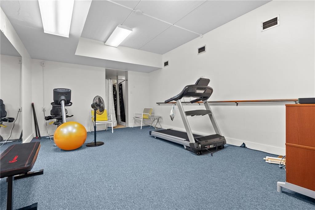 1500 Cochran Road, Unit 412 Pittsburgh, PA 15243 - Photo 33 of 45 a view of a room with gym equipment