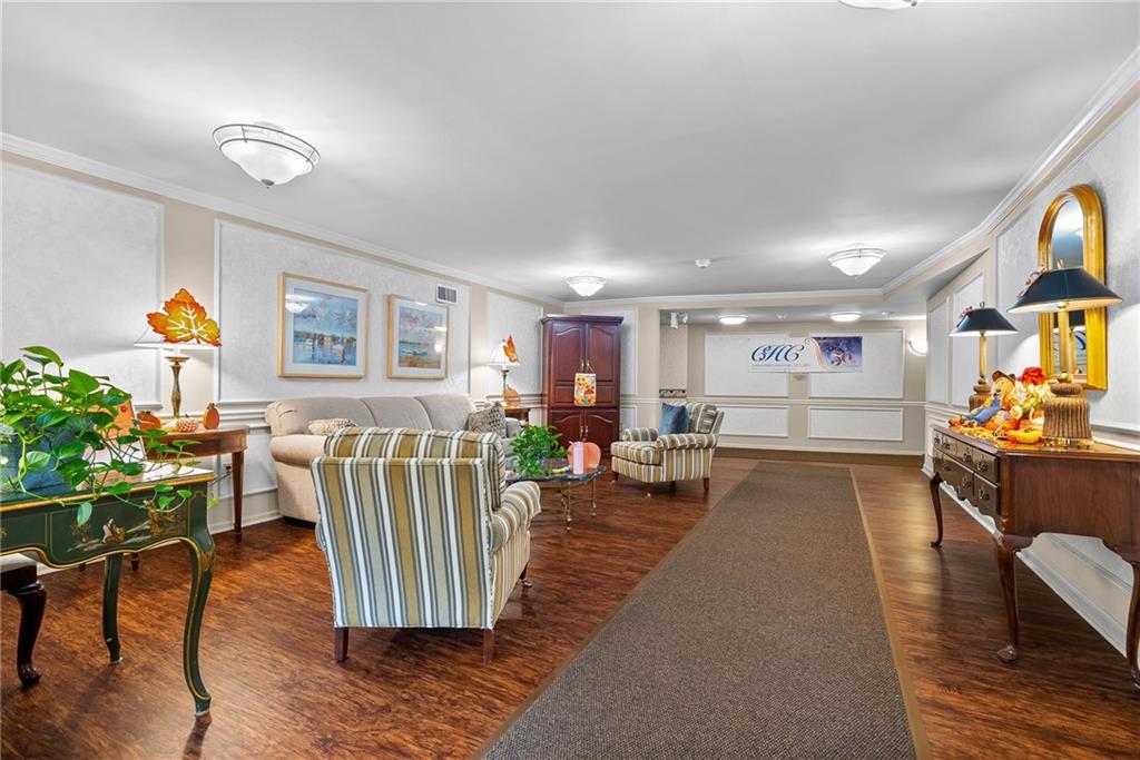1500 Cochran Road, Unit 412 Pittsburgh, PA 15243 - Photo 6 of 45 a living room with furniture and a table