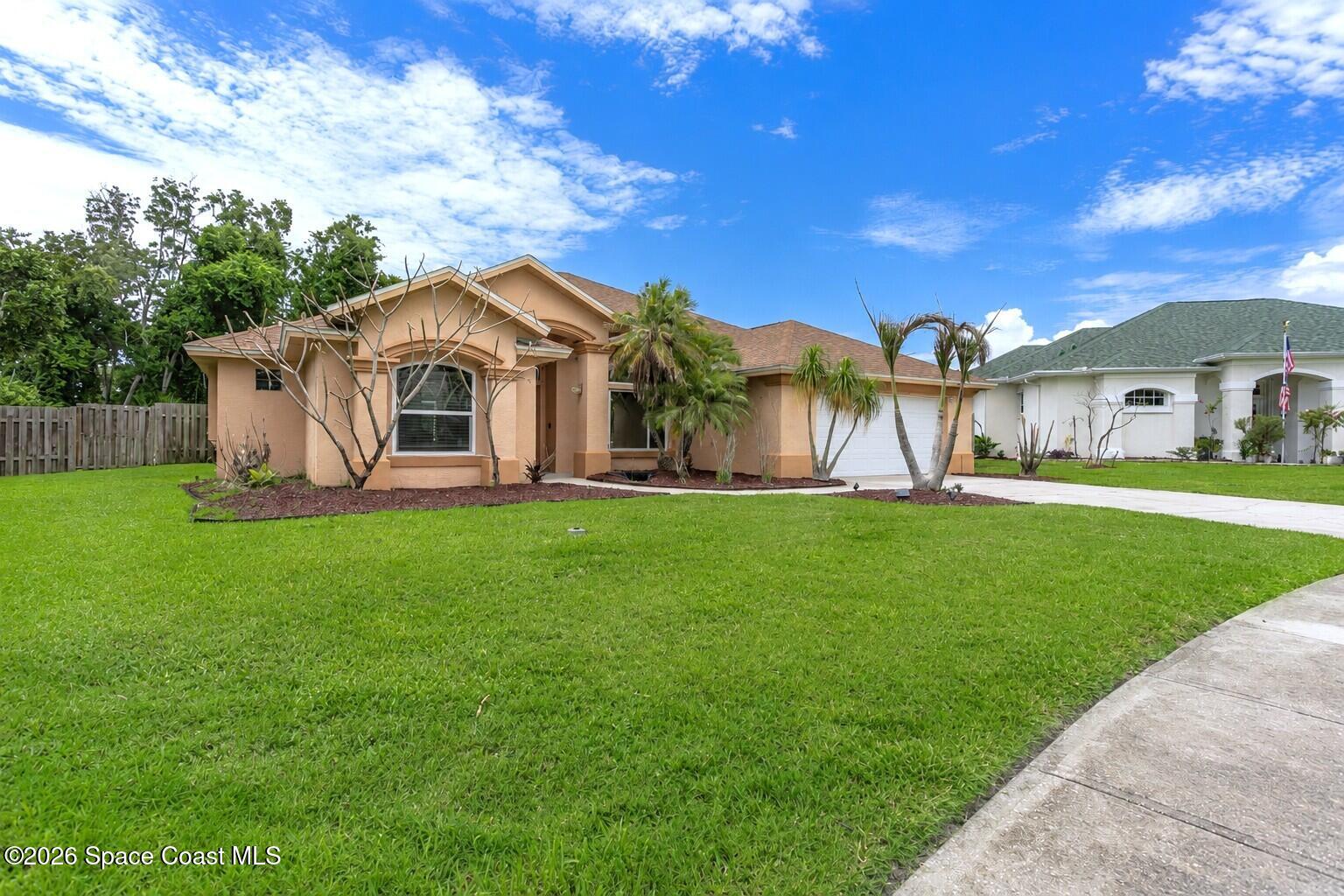 1697 Atrium Drive Melbourne, FL 32935 - Photo 33 of 36 Front left Corner
