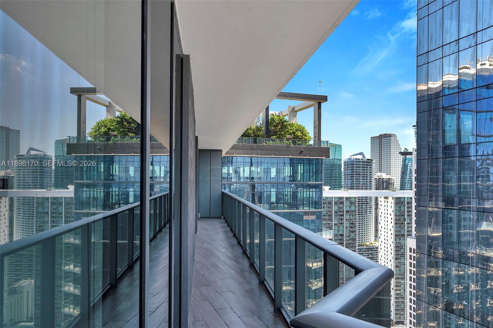 801 South Miami Avenue, Unit 4404 Miami, FL 33131 - Photo 12 of 37 a view of balcony with wooden floor