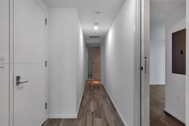 a bathroom with a shower a toilet and sink