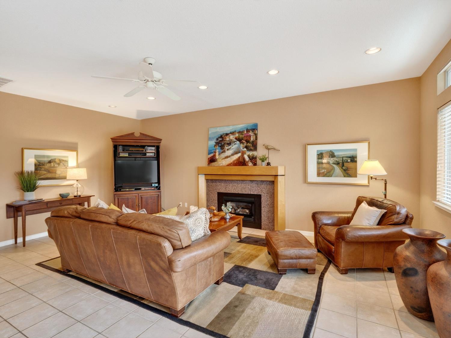 416 Merganser Place Davis, CA 95616 - Photo 11 of 46 a living room with furniture and a fireplace