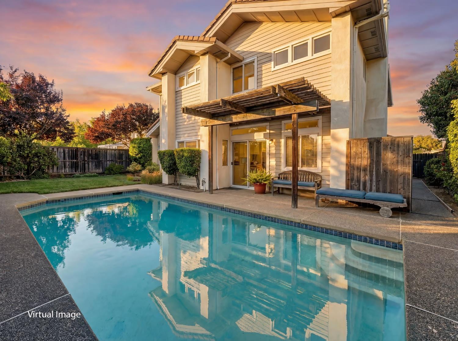 416 Merganser Place Davis, CA 95616 - Photo 2 of 46 a view of a swimming pool with outdoor seating