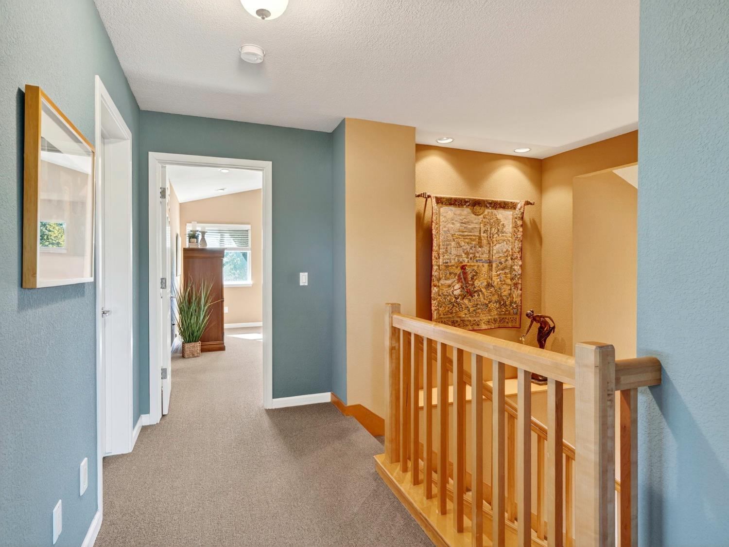 416 Merganser Place Davis, CA 95616 - Photo 21 of 46 a view of a hallway with wooden floor and entryway