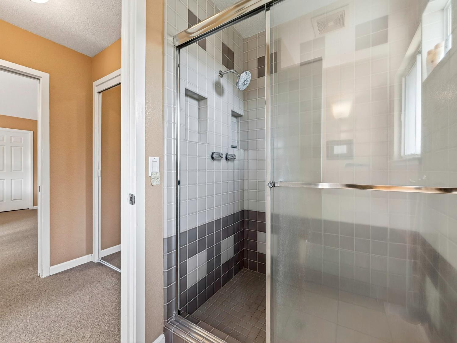 416 Merganser Place Davis, CA 95616 - Photo 27 of 46 a bathroom with a shower and a sink