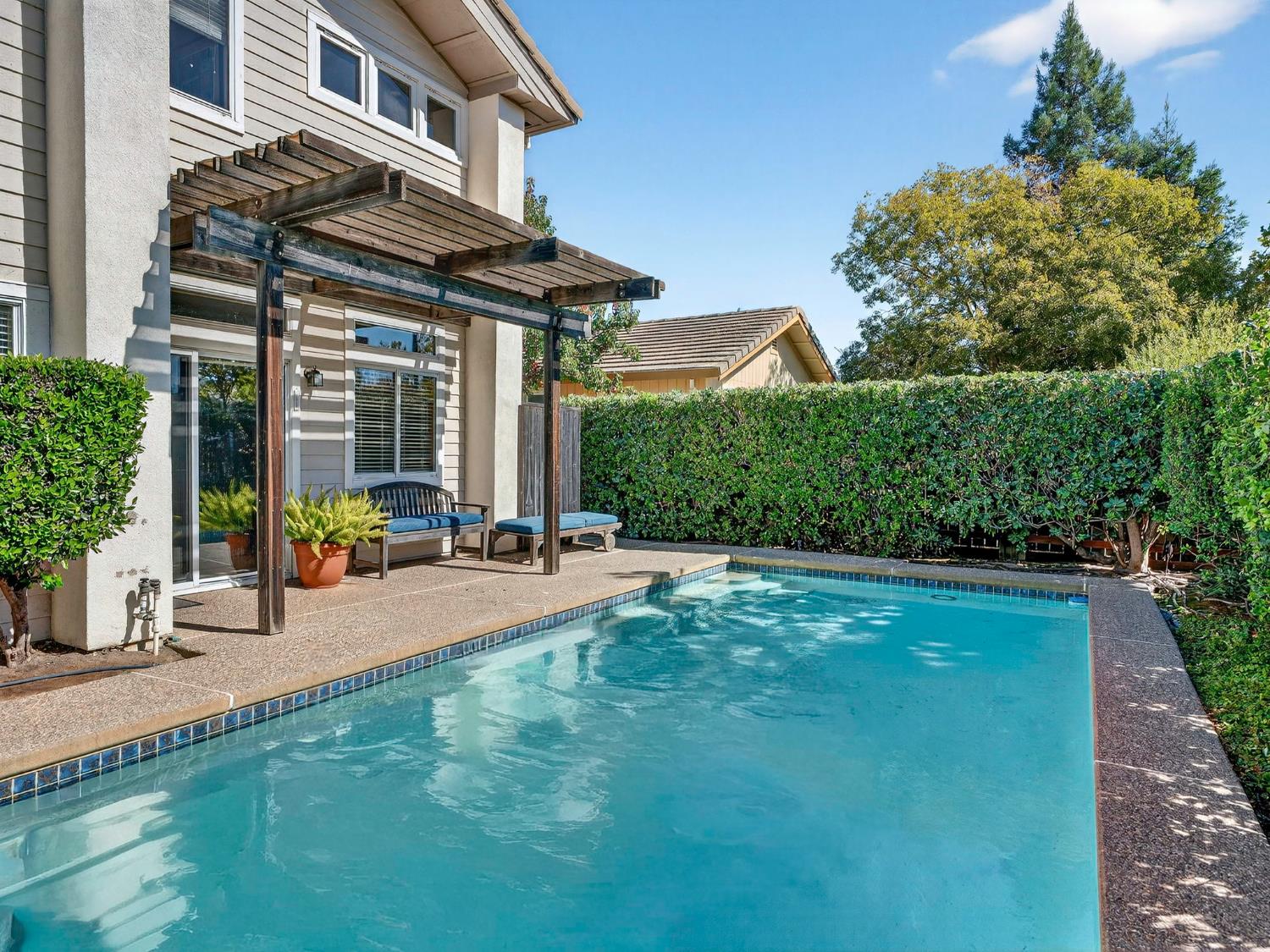 416 Merganser Place Davis, CA 95616 - Photo 36 of 46 a view of a house with backyard porch and sitting area