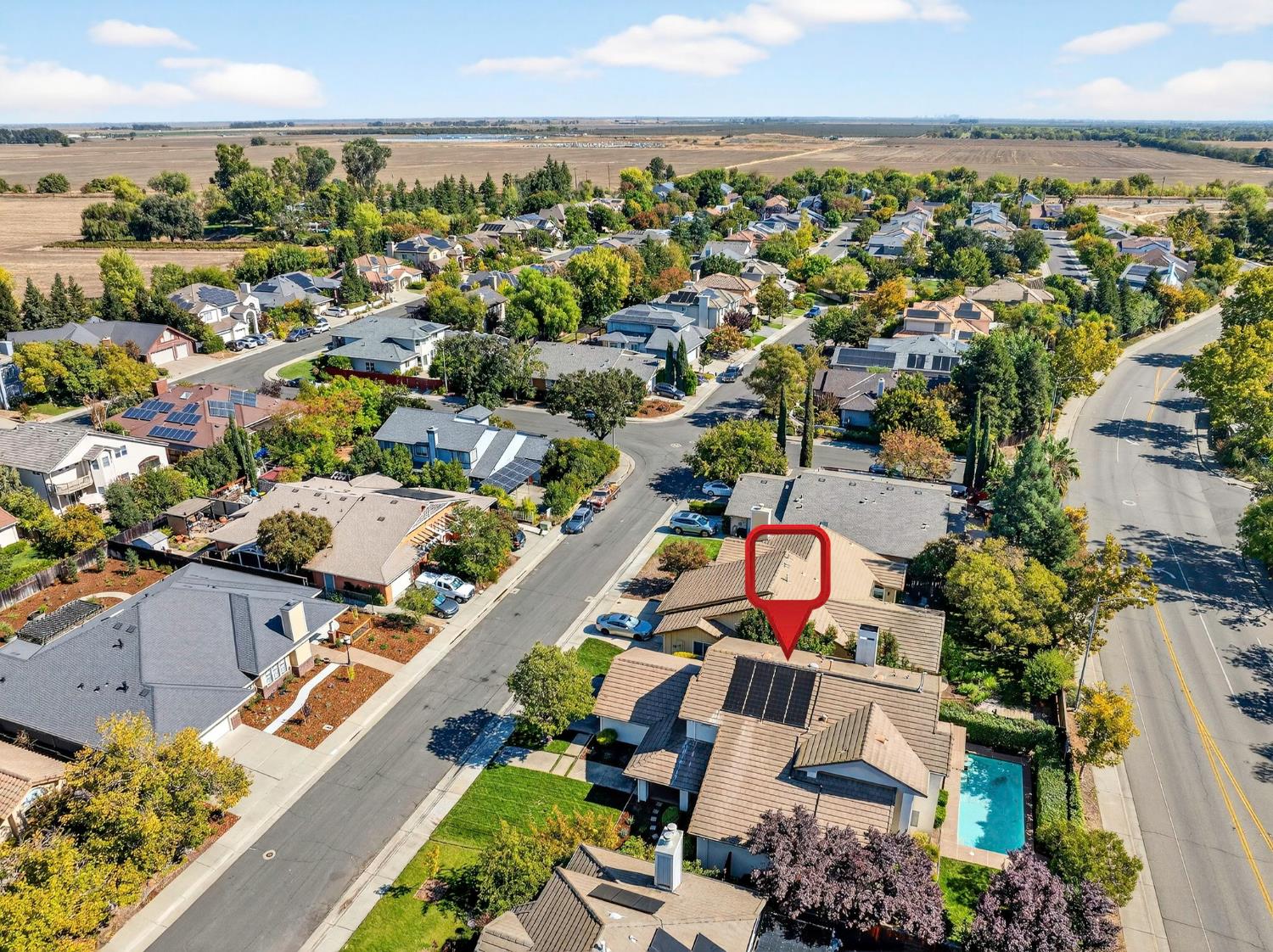 416 Merganser Place Davis, CA 95616 - Photo 42 of 46 an aerial view of a city with lots of residential buildings and mountain view in back
